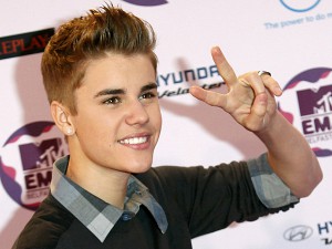 Canadian pop star Justin Bieber poses on arrival on the red carpet at the MTV Europe Music Awards show in Belfast