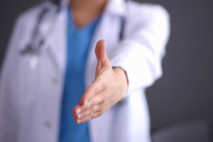 Female doctor&amp;amp;amp;#39;s handshake , isolated on